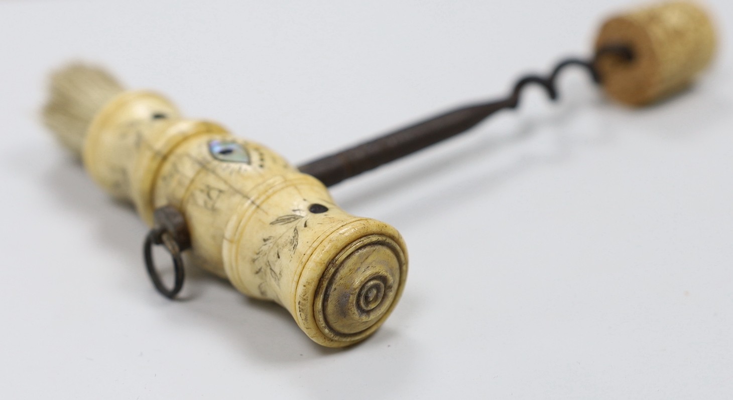 A 19th century carved bone handled cork screw, dated 1842
